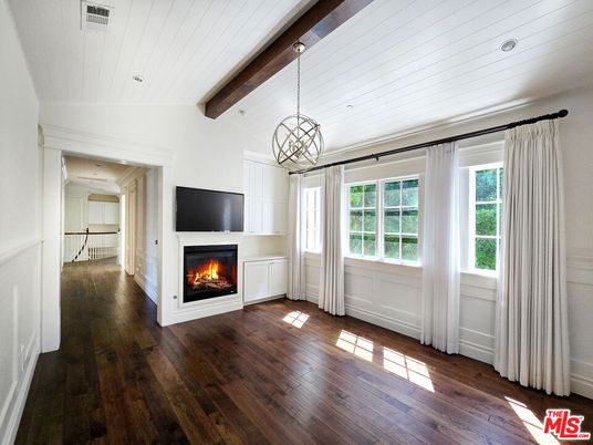 Empty room, Fireplace, Interior, Pendant Lights, Recessed Lighting, Wooden Beams, Wood Texture Flooring