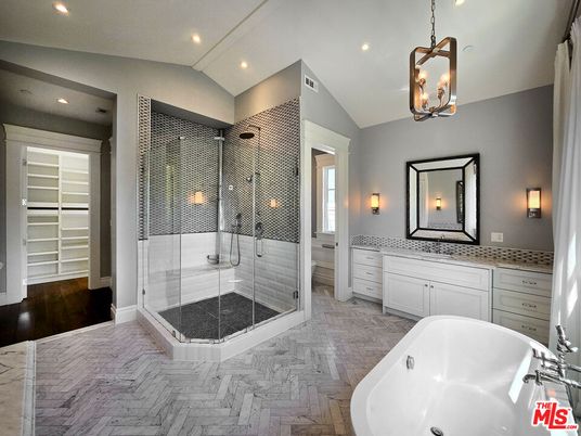 Bathroom, Dual Sink Vanities, Free Standing Baths, Glass Shower, Interior, Marble, Pendant Lights, Recessed Lighting, Wood Texture Flooring