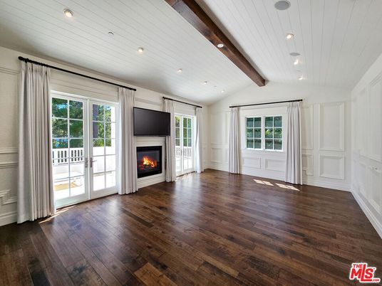 Empty room, Fireplace, Interior, Pendant Lights, Recessed Lighting, Wooden Beams, Wood Texture Flooring