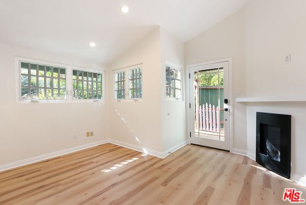 Empty room, Fireplace, Interior, Recessed Lighting, Wood Texture Flooring