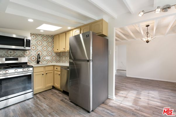 Chandelier, Interior, Kitchen, Recessed Lighting, Stainless Steel Appliances, Wood Texture Flooring