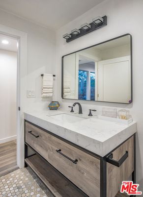 Bathroom, Dual Sink Vanities, Interior, Recessed Lighting, Wood Texture Flooring