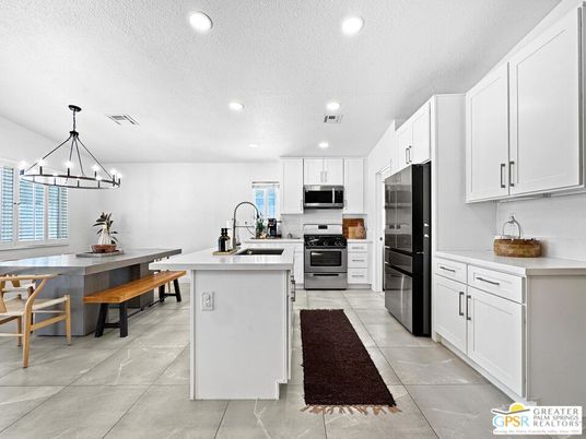 Chandelier, Dining room, Interior, Kitchen, Pendant Lights, Recessed Lighting, Stainless Steel Appliances