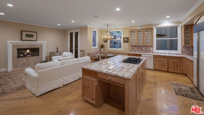 Chandelier, Dining room, Fireplace, Interior, Kitchen, Living room, Recessed Lighting, Tile Countertops, Wood Texture Flooring