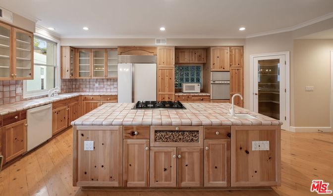 Interior, Kitchen, Recessed Lighting, Tile Countertops, Wood Texture Flooring