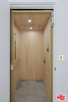 Elevator, Interior, Recessed Lighting, Wooden Walls