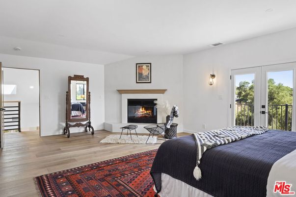 Bedroom, Fireplace, Interior, Recessed Lighting, Wood Texture Flooring