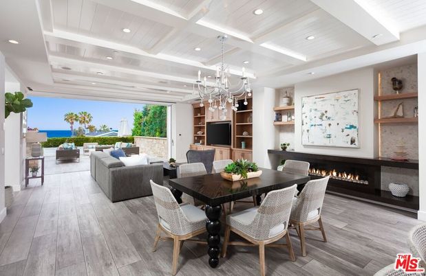 Chandelier, Dining room, Fireplace, Interior, Living room, Recessed Lighting, Water, Wood Texture Flooring