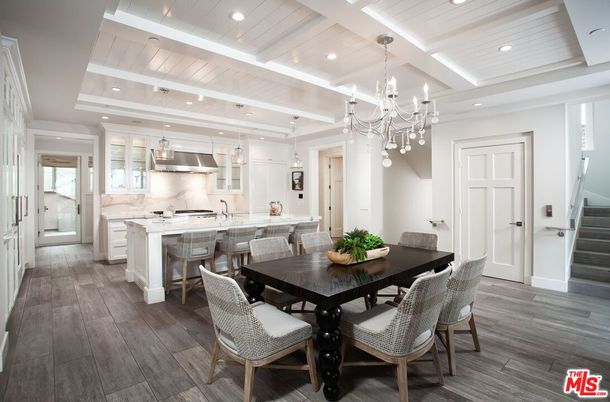 Chandelier, Dining room, Interior, Kitchen, Pendant Lights, Recessed Lighting, Stainless Steel Appliances, Wood Texture Flooring