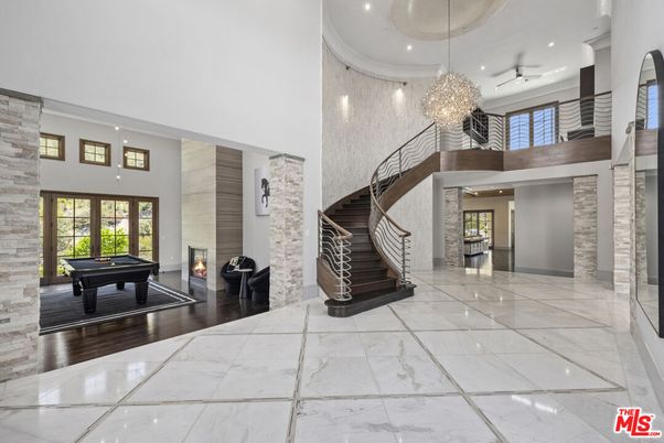 Billiard Table, Chandelier, Fireplace, Game Room, Interior, Marble, Recessed Lighting, Wood Texture Flooring
