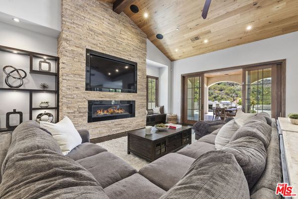Dining room, Fireplace, Interior, Living room, Recessed Lighting, Stone Walls, Wooden Beams, Wooden Ceilings