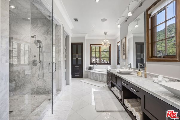 Bathroom, Chandelier, Dual Sink Vanities, Glass Shower, Interior, Marble Walls, Recessed Lighting
