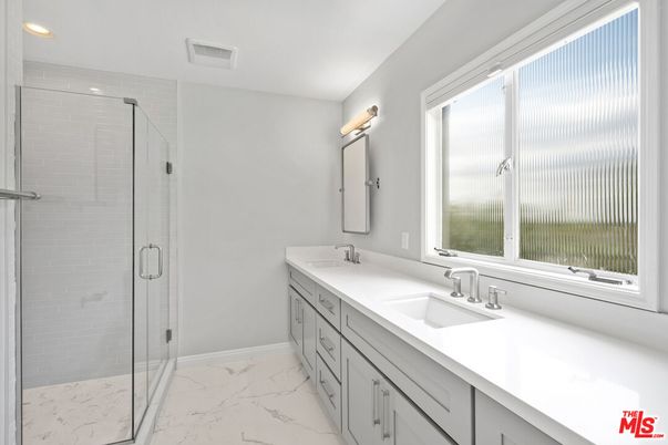 Bathroom, Dual Sink Vanities, Glass Shower, Interior, Marble, Recessed Lighting