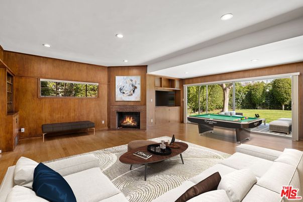 Billiard Table, Fireplace, Game Room, Interior, Living room, Recessed Lighting, Wood Texture Flooring, Wooden Walls