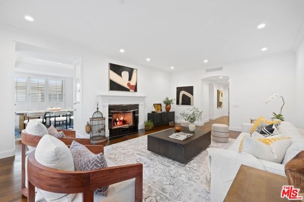 Dining room, Fireplace, Interior, Living room, Recessed Lighting, Wood Texture Flooring