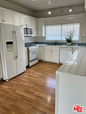 Interior, Kitchen, Tile Countertops, Wood Texture Flooring