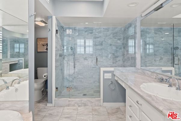 Bathroom, Dual Sink Vanities, Glass Shower, Interior, Marble, Marble Walls, Recessed Lighting