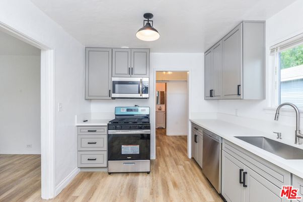Interior, Kitchen, Pendant Lights, Stainless Steel Appliances, Wood Texture Flooring