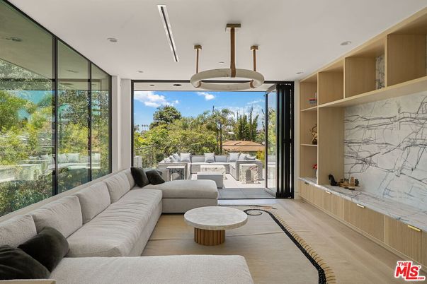 Fireplace, Interior, Living room, Marble Walls, Recessed Lighting, Wood Texture Flooring