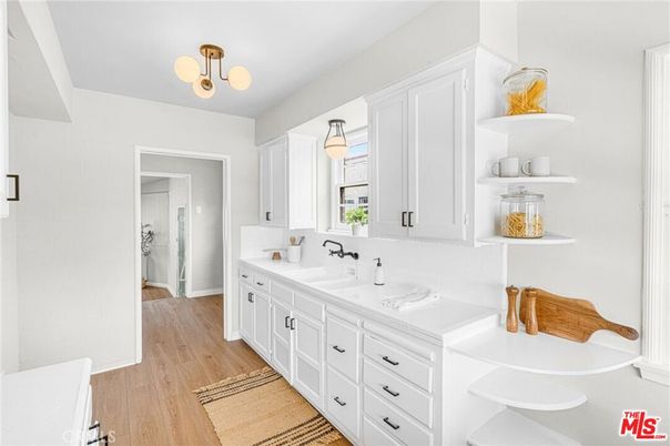 Bathroom, Dual Sink Vanities, Interior, Pendant Lights, Wood Texture Flooring