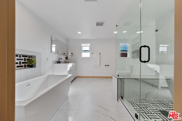 Bathroom, Dual Sink Vanities, Glass Shower, Interior, Marble, Marble Walls, Recessed Lighting