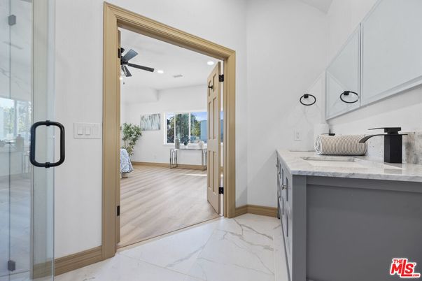 Bathroom, Glass Shower, Interior, Marble, Recessed Lighting, Wood Texture Flooring