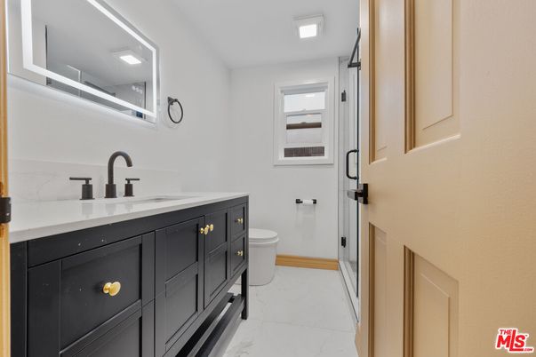 Bathroom, Dual Sink Vanities, Glass Shower, Interior, Marble, Recessed Lighting