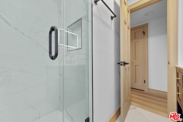 Bathroom, Glass Shower, Interior, Marble Walls, Wood Texture Flooring