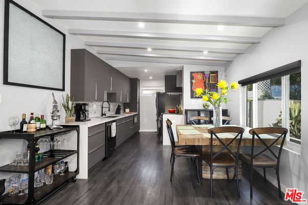 Dining room, Interior, Kitchen, Recessed Lighting, Stainless Steel Appliances, Wood Texture Flooring