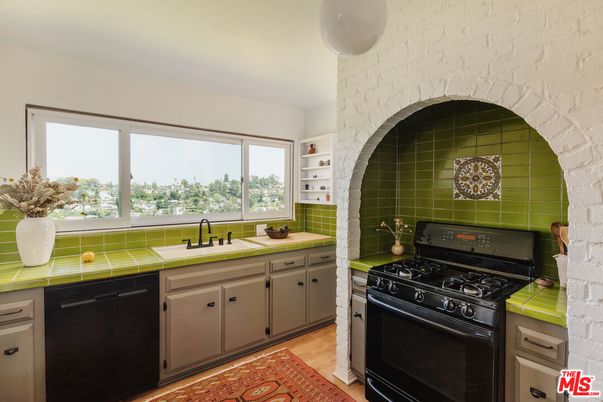 Interior, Kitchen, Stainless Steel Appliances, Tile Countertops, Wood Texture Flooring