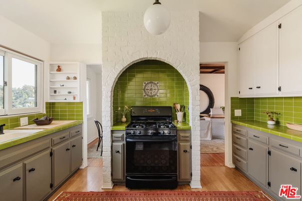 Interior, Kitchen, Pendant Lights, Tile Countertops, Wood Texture Flooring