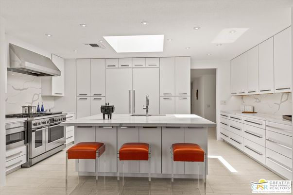 Interior, Kitchen, Marble Walls, Recessed Lighting, Stainless Steel Appliances