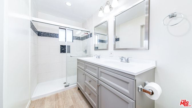 Bathroom, Dual Sink Vanities, Glass Shower, Interior, Recessed Lighting, Wood Texture Flooring