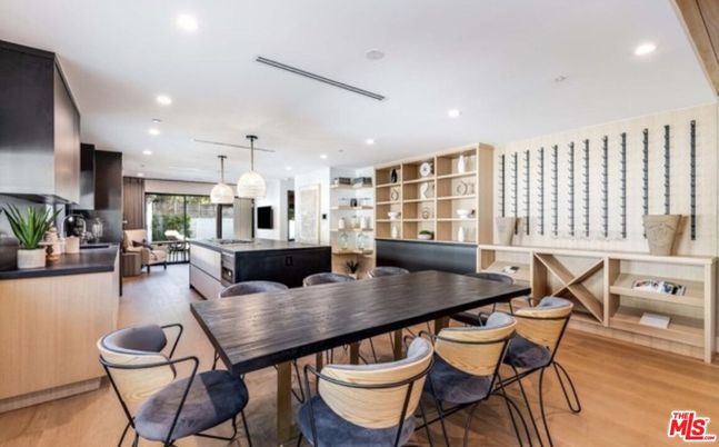 Dining room, Interior, Kitchen, Pendant Lights, Recessed Lighting, Stainless Steel Appliances, Wine Storage, Wood Texture Flooring