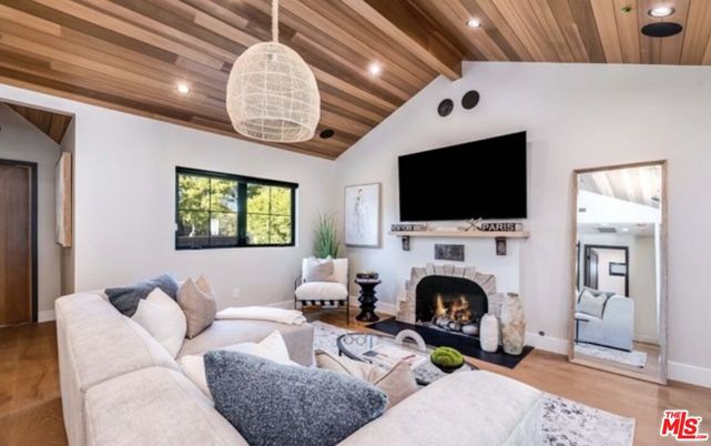 Fireplace, Interior, Living room, Pendant Lights, Recessed Lighting, Wooden Ceilings, Wood Texture Flooring
