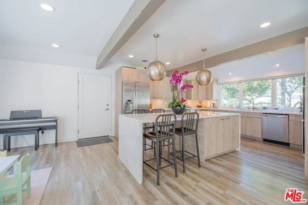 Interior, Kitchen, Pendant Lights, Piano, Recessed Lighting, Stainless Steel Appliances, Wood Texture Flooring