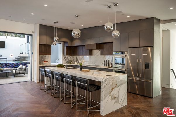 Interior, Kitchen, Marble Walls, Pendant Lights, Recessed Lighting, Stainless Steel Appliances, Wood Texture Flooring