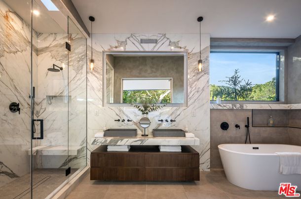 Bathroom, Dual Sink Vanities, Free Standing Baths, Glass Shower, Interior, Marble Walls, Pendant Lights, Recessed Lighting