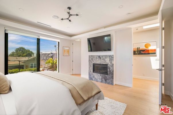 Bedroom, Fireplace, Interior, Recessed Lighting, Wood Texture Flooring