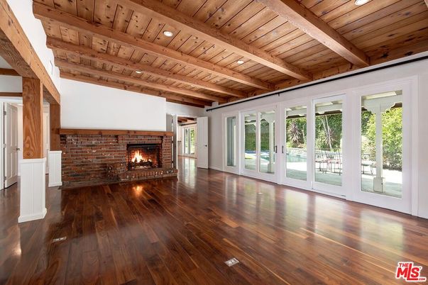 Empty room, Fireplace, Interior, Recessed Lighting, Stone Walls, Wooden Beams, Wooden Ceilings, Wood Texture Flooring
