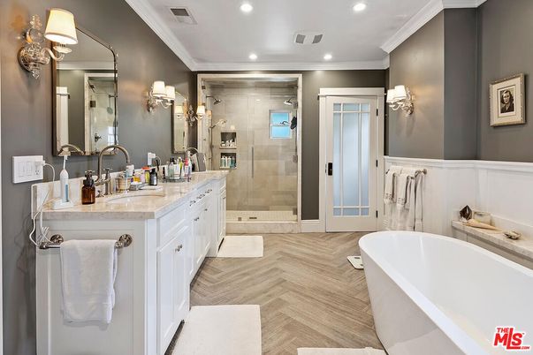 Bathroom, Dual Sink Vanities, Free Standing Baths, Glass Shower, Interior, Recessed Lighting, Wood Texture Flooring