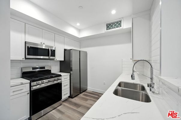 Interior, Kitchen, Recessed Lighting, Stainless Steel Appliances, Wood Texture Flooring