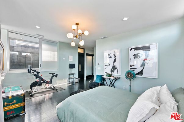Bedroom, Fitness Equipment, Interior, Pendant Lights, Recessed Lighting, Wood Texture Flooring