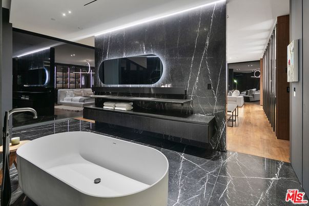 Bathroom, Free Standing Baths, Interior, Marble, Marble Walls, Recessed Lighting, Wood Texture Flooring