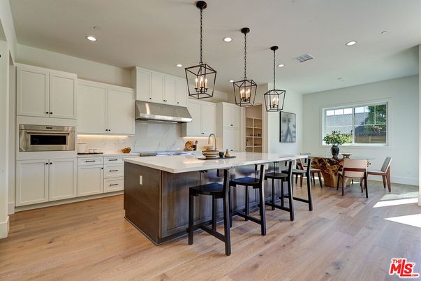 Dining room, Interior, Kitchen, Pendant Lights, Recessed Lighting, Stainless Steel Appliances, Wood Texture Flooring
