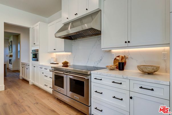 Interior, Kitchen, Marble Walls, Stainless Steel Appliances, Wood Texture Flooring