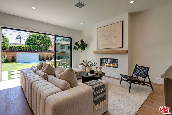 Fireplace, Interior, Living room, Recessed Lighting, Wood Texture Flooring