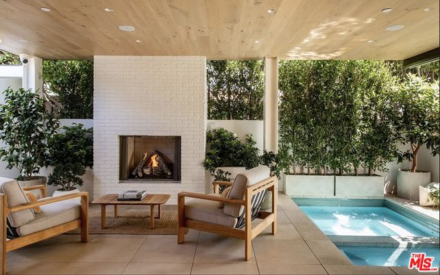 Exterior, Fireplace, Pool