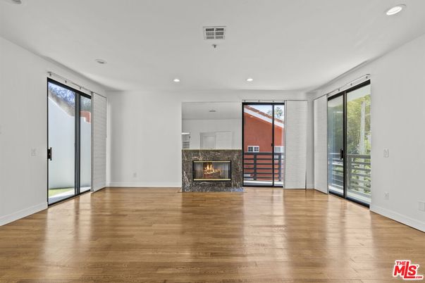 Empty room, Fireplace, Interior, Recessed Lighting, Wood Texture Flooring