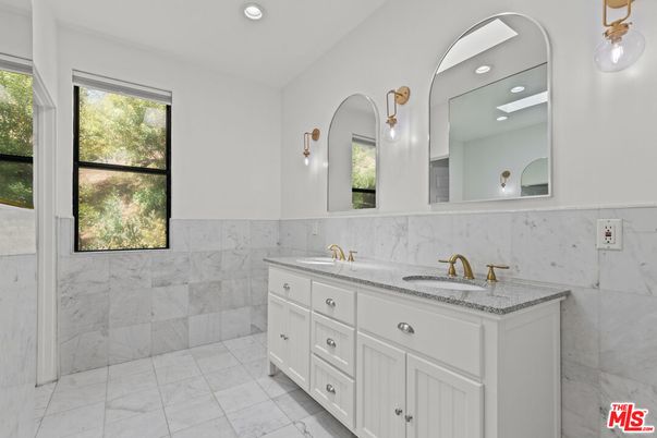Bathroom, Dual Sink Vanities, Interior, Marble, Marble Walls, Recessed Lighting